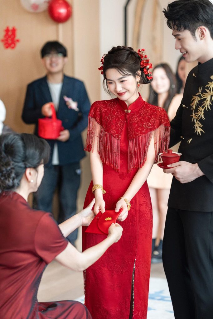 Bride prefers to wear red clothing in her wedding.