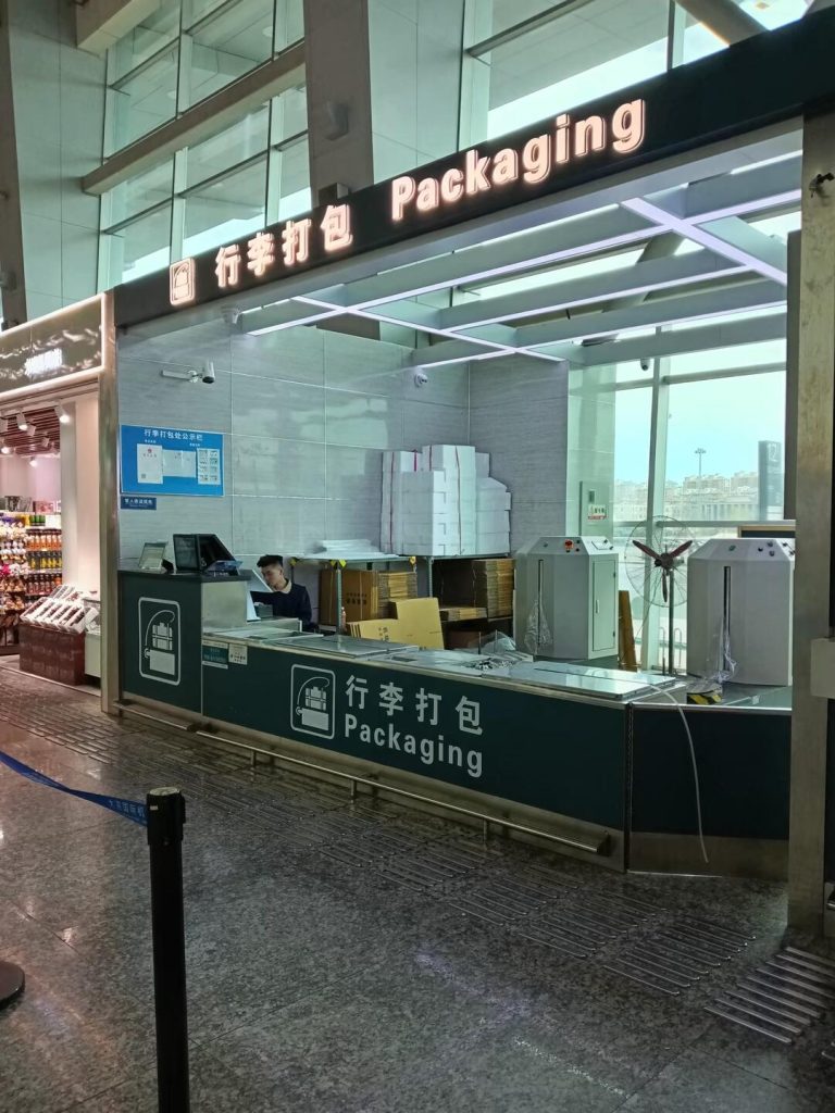 Luggage packing counter in an airport